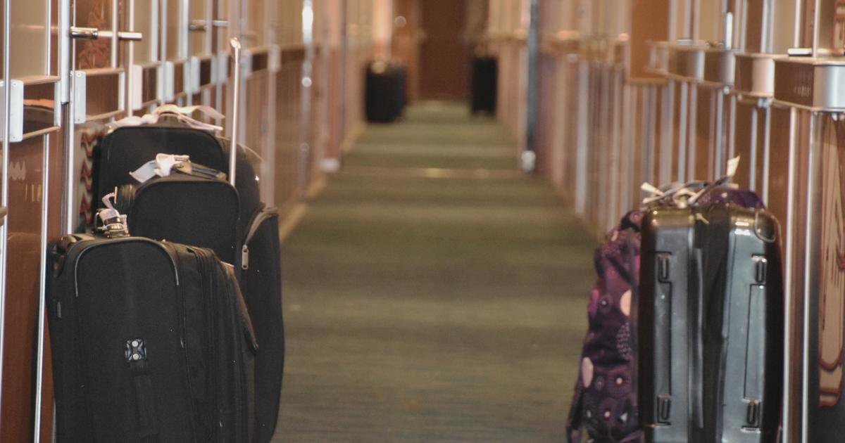 Luggage in cruise hallway